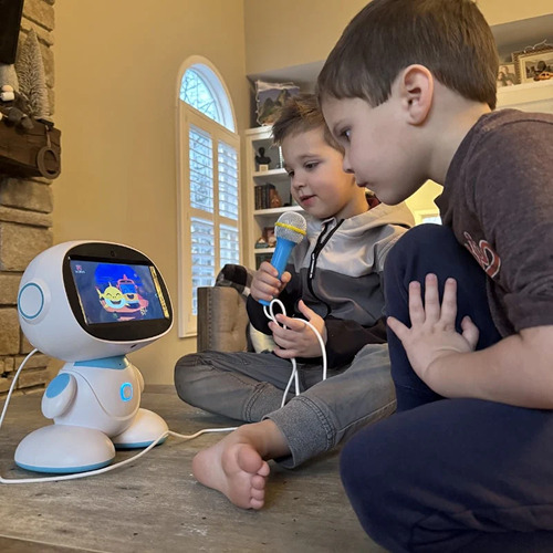 The blue STEM learning robot with its touchscreen face and microphone