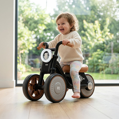 The Tiny Biker ride-on motorcycle in Knight Black, side view