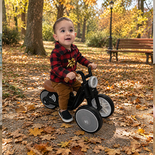 The Tiny Biker ride-on motorcycle in Knight Black, side view
