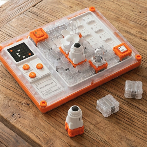 The STEM Circuit Puzzle Board with its snap-together blocks laid out on a table