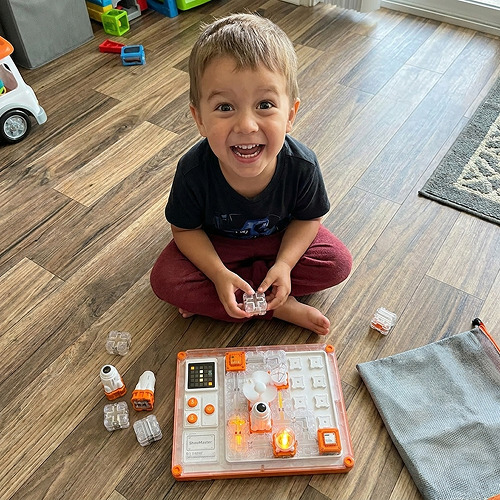 The STEM Circuit Puzzle Board with its snap-together blocks laid out on a table