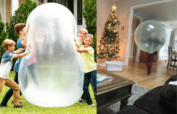 grandkids playing with the giant jelly balloon ball