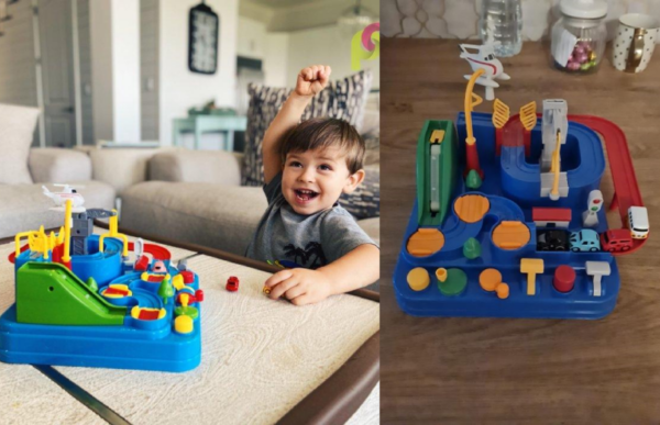 a grandson playing with the car rescue adventure toy