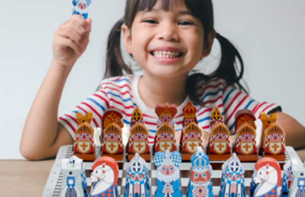 a granddaughter playing checkmate kingdom chess