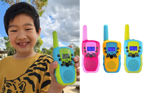 a young boy using the kids walkie talkie