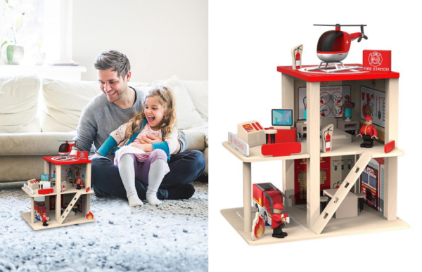 dad and daughter playing with the rescue station playset